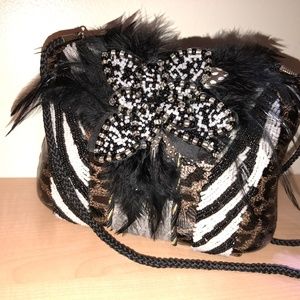 Small hand bag.....Beads..feathers...so elegant!